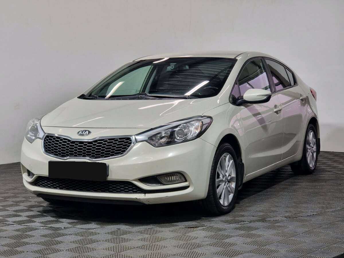 Kia Cerato 2014 года с пробегом. Посмотреть фото