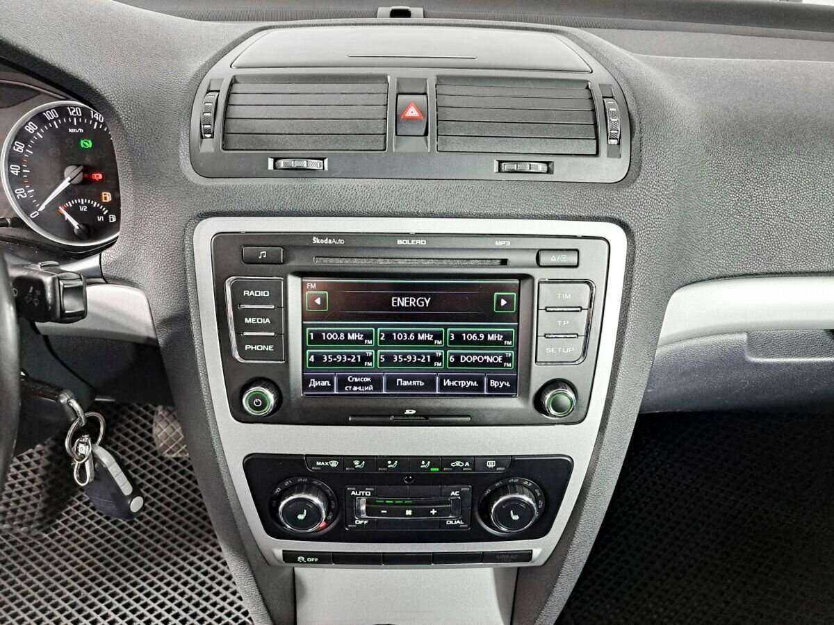 Skoda Octavia 2012 года с пробегом. Фото: #11