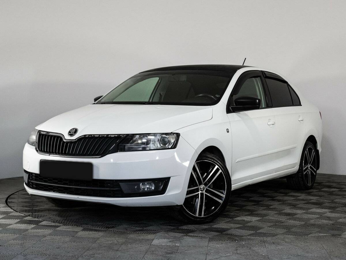 Skoda Rapid 2015 года с пробегом. Посмотреть фото