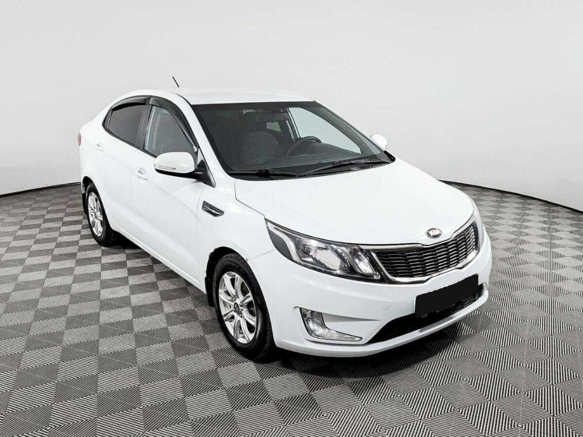 Kia Rio 2013 года с пробегом. Фото: #2