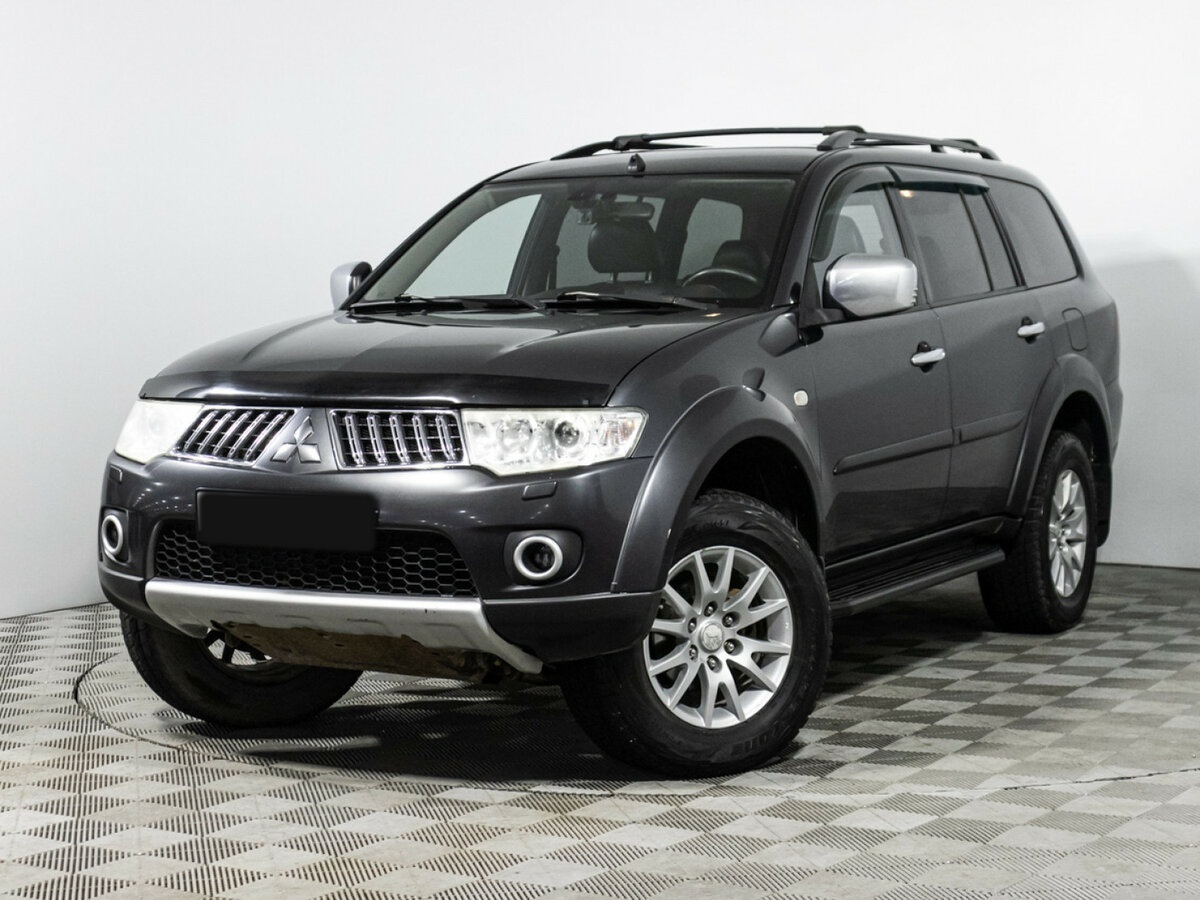 Mitsubishi Pajero Sport 2013 года с пробегом. Посмотреть фото