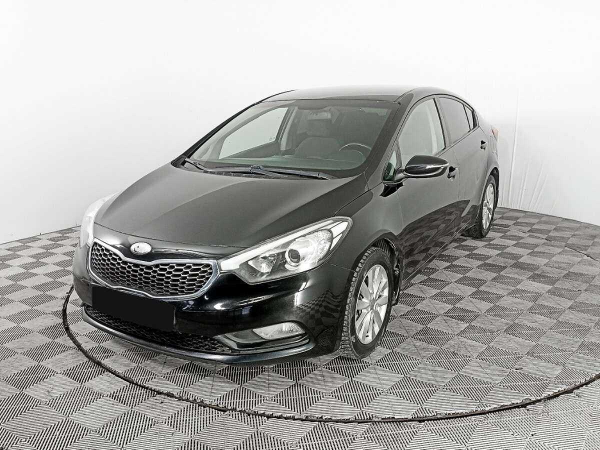 Kia Cerato 2013 года с пробегом. Посмотреть фото