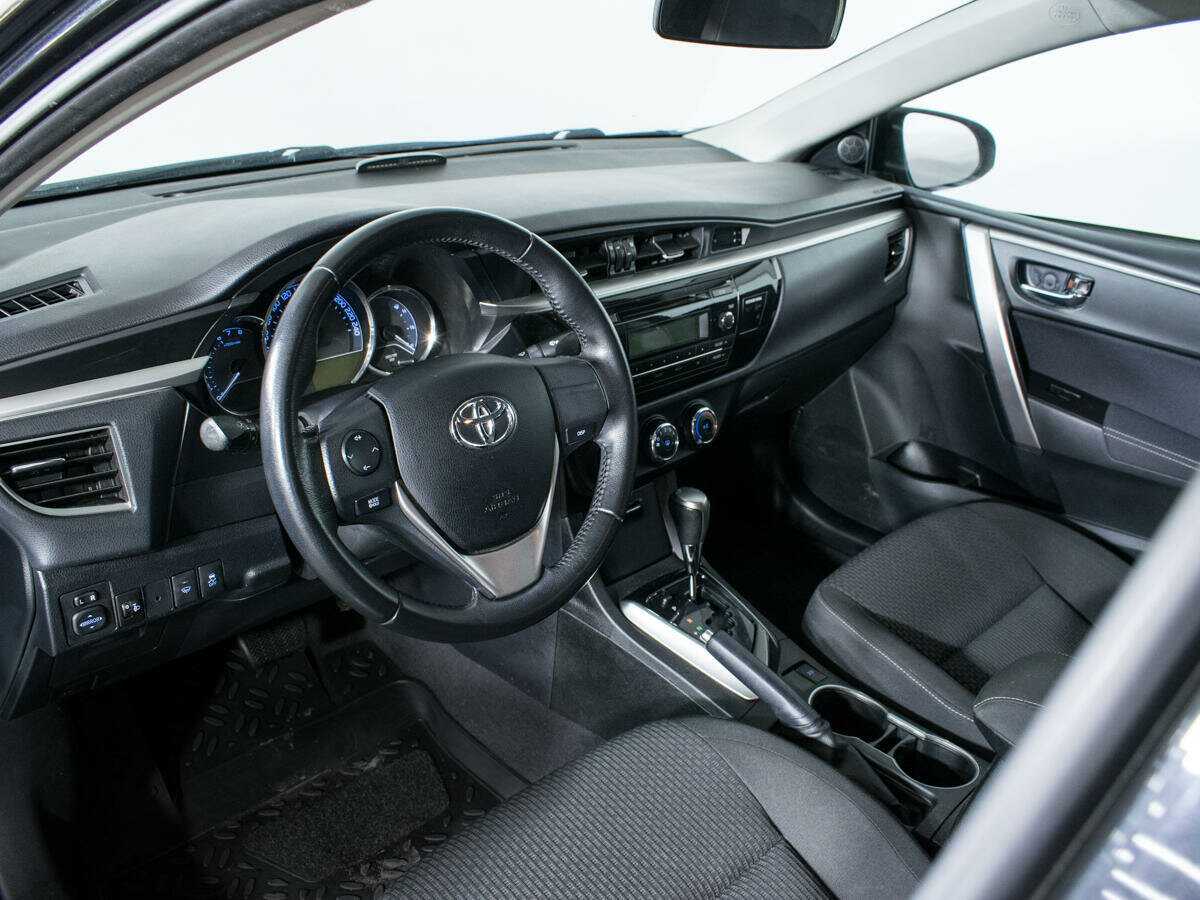 Toyota Corolla 2013 года с пробегом. Фото: #12