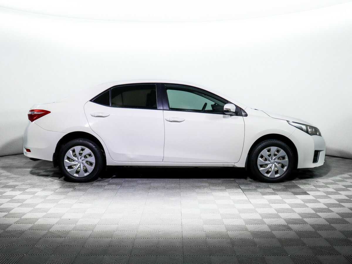 Toyota Corolla 2014 года с пробегом. Фото: #3