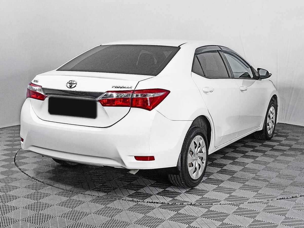 Toyota Corolla 2013 года с пробегом. Фото: #4