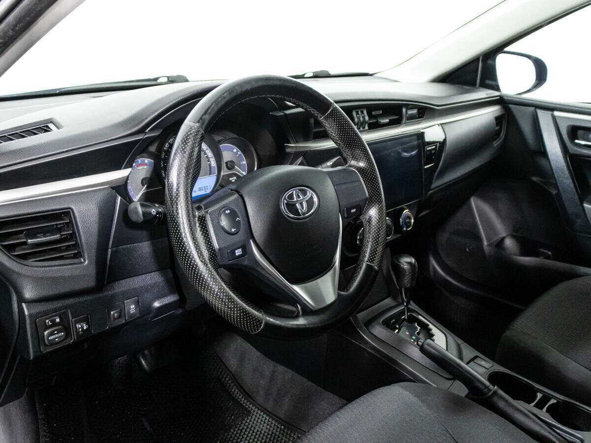 Toyota Corolla 2013 года с пробегом. Фото: #10