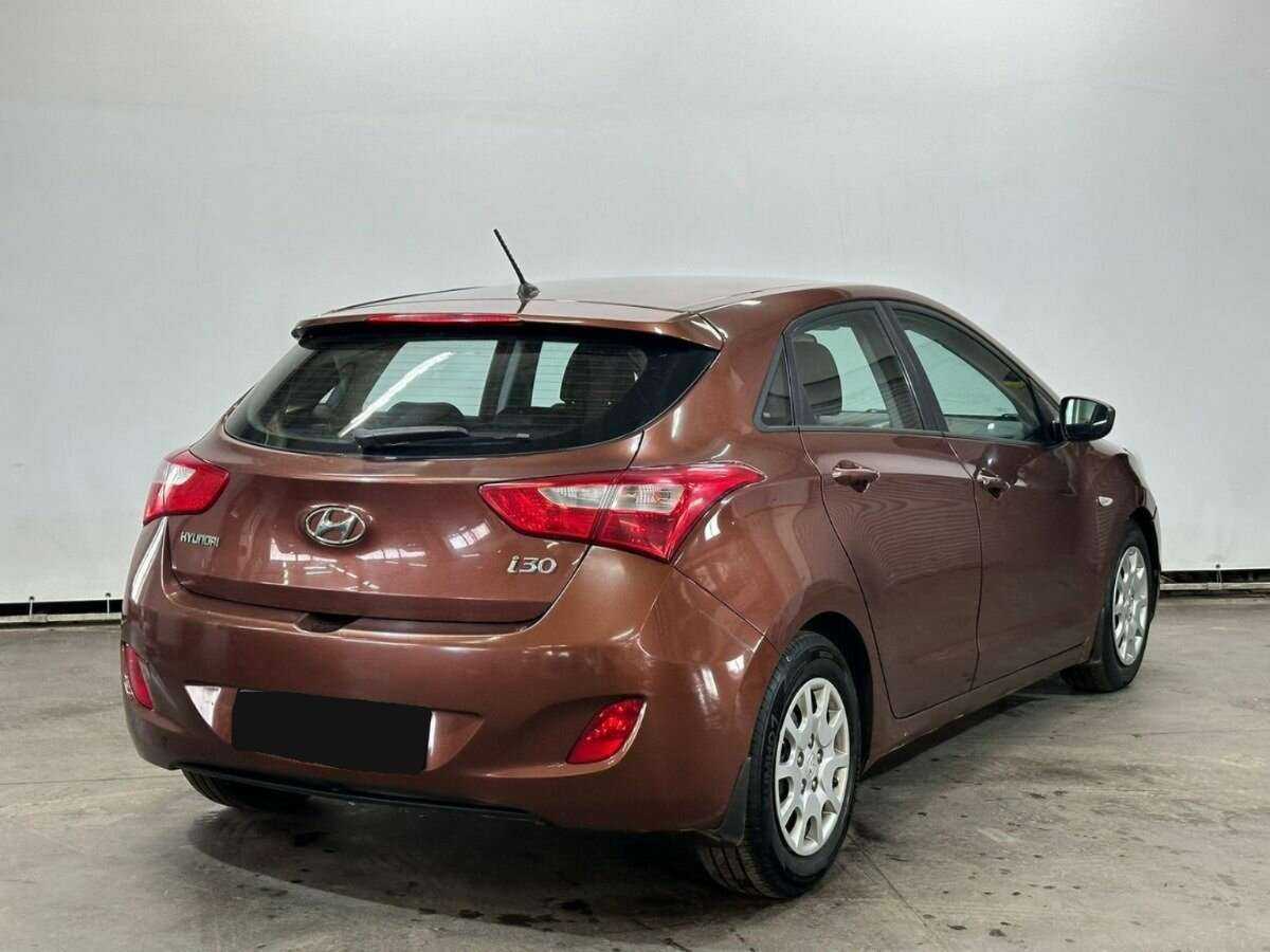 Hyundai i30 2012 года с пробегом. Фото: #4