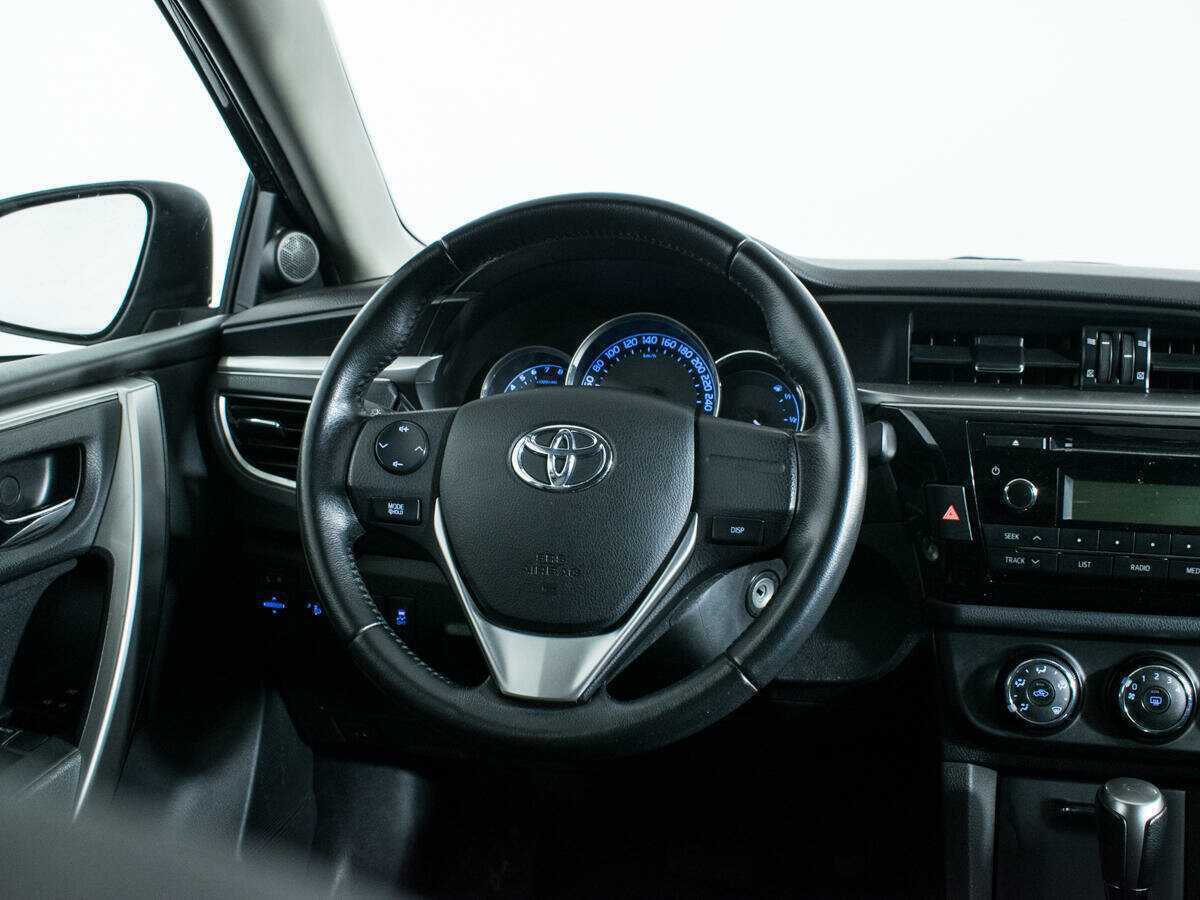 Toyota Corolla 2013 года с пробегом. Фото: #13