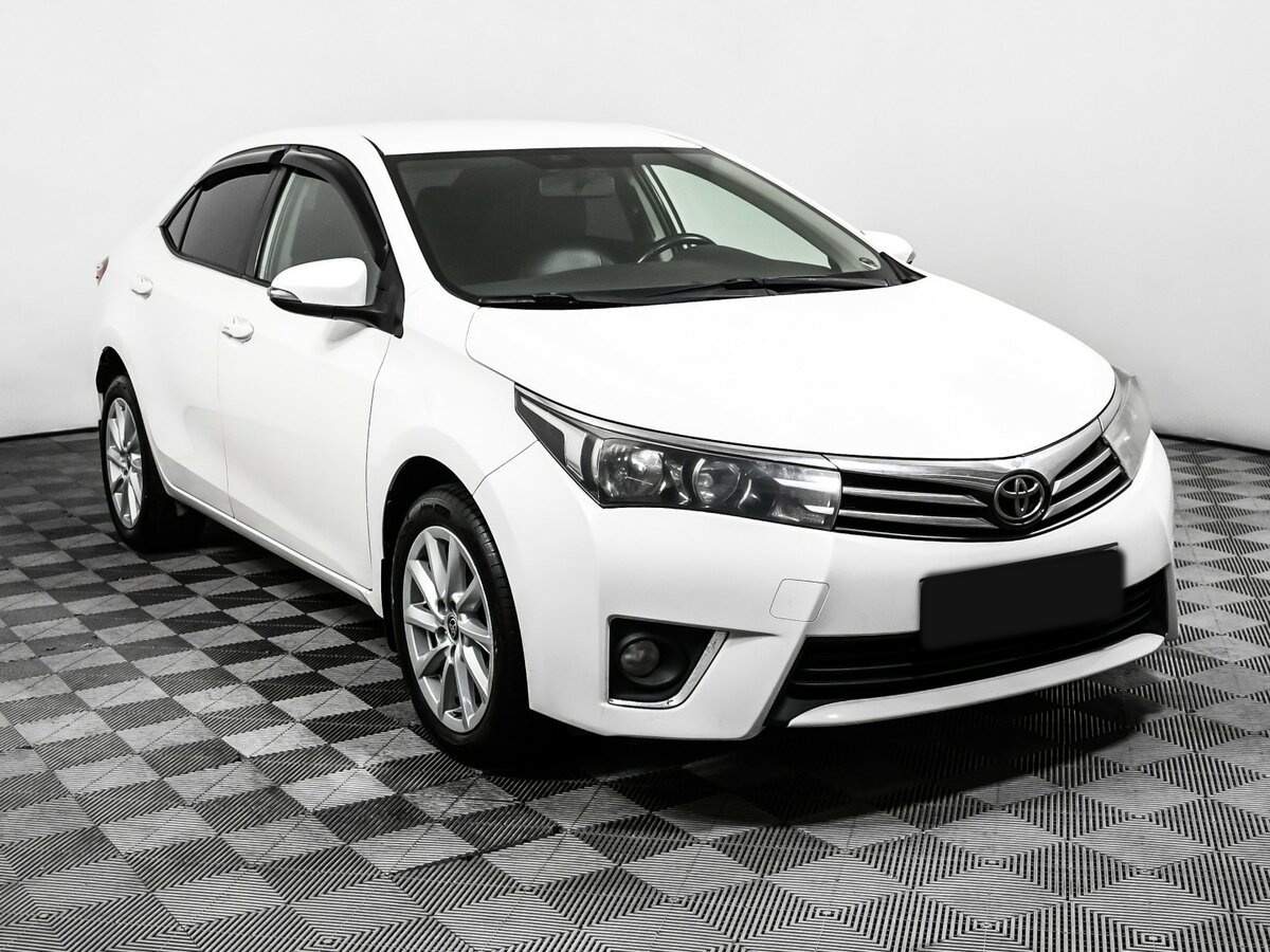 Toyota Corolla 2013 года с пробегом. Фото: #2
