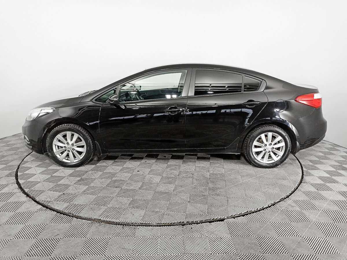 Kia Cerato 2013 года с пробегом. Фото: #7