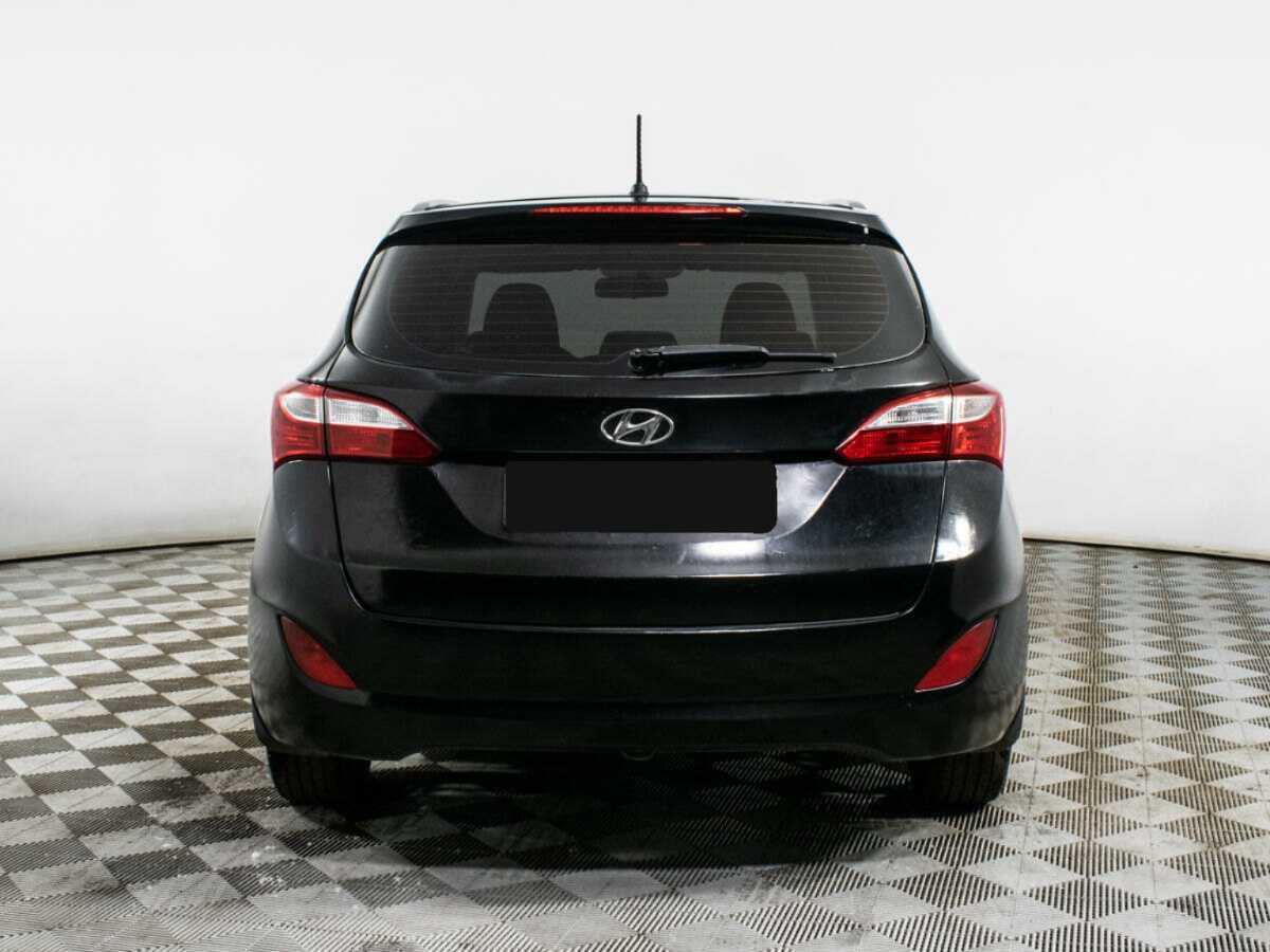 Hyundai i30 2012 года с пробегом. Фото: #5
