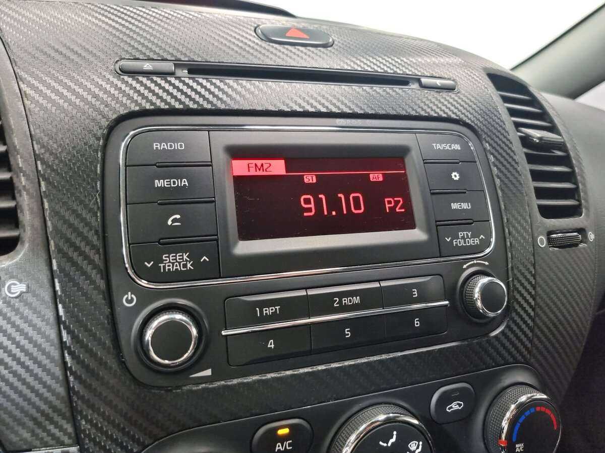 Kia Cerato 2014 года с пробегом. Фото: #14