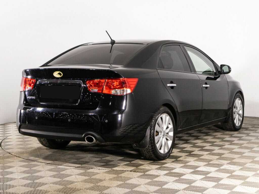 Kia Cerato 2012 года с пробегом. Фото: #4