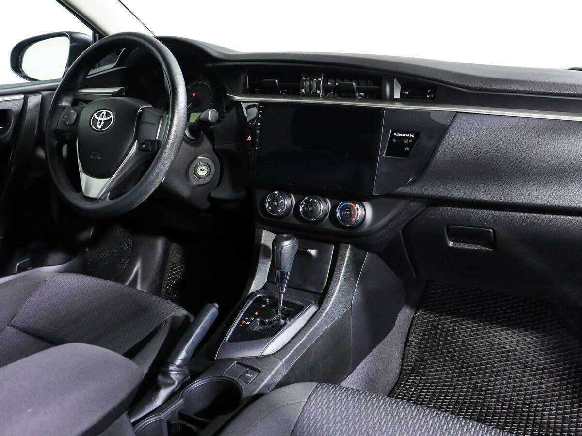 Toyota Corolla 2013 года с пробегом. Фото: #5