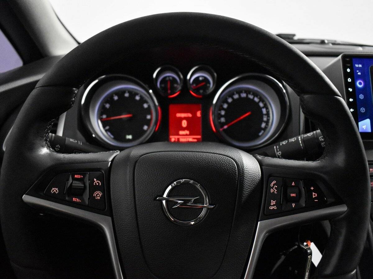 Opel Astra 2013 года с пробегом. Фото: #16