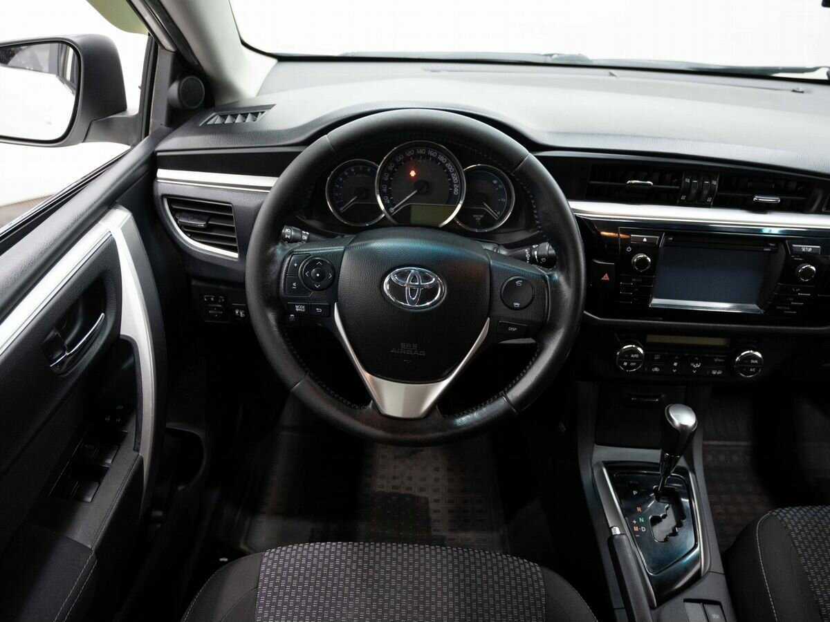 Toyota Corolla 2013 года с пробегом. Фото: #15