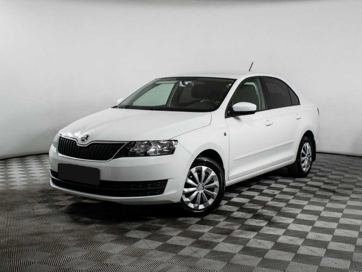 Skoda Rapid 2014 года с пробегом. Посмотреть фото