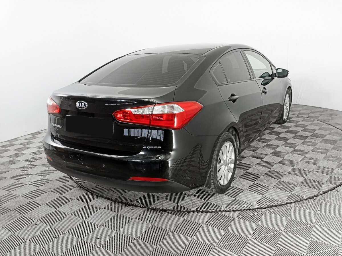 Kia Cerato 2013 года с пробегом. Фото: #4