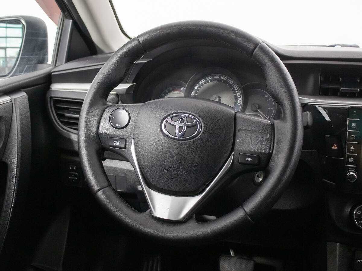 Toyota Corolla 2014 года с пробегом. Фото: #14