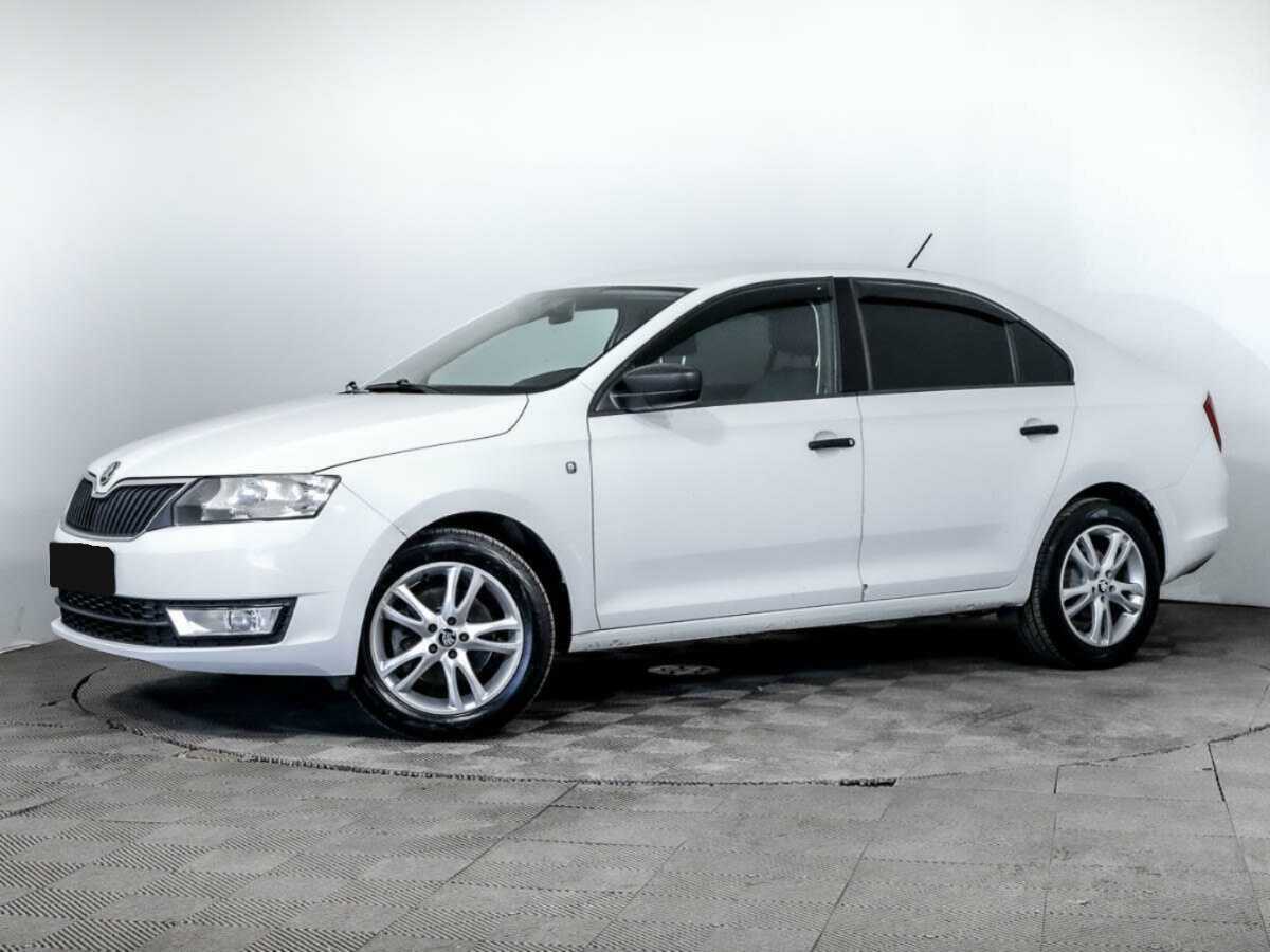 Skoda Rapid 2014 года с пробегом. Посмотреть фото