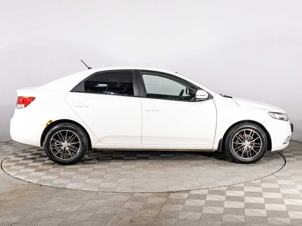 Kia Cerato 2012 года с пробегом. Фото: #3