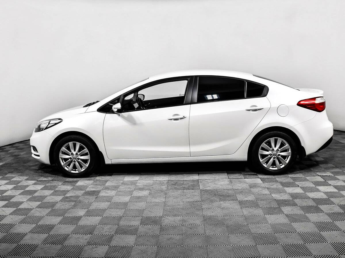 Kia Cerato 2013 года с пробегом. Фото: #7