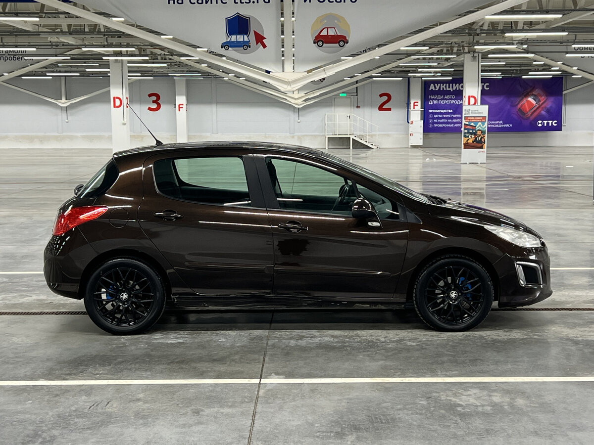 Peugeot 308 2012 года с пробегом. Фото: #3