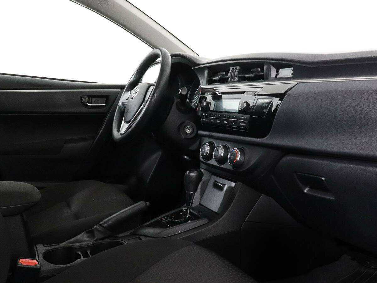 Toyota Corolla 2013 года с пробегом. Фото: #5