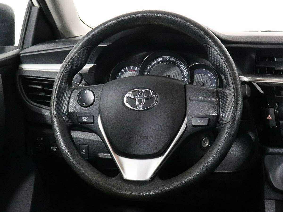 Toyota Corolla 2013 года с пробегом. Фото: #10