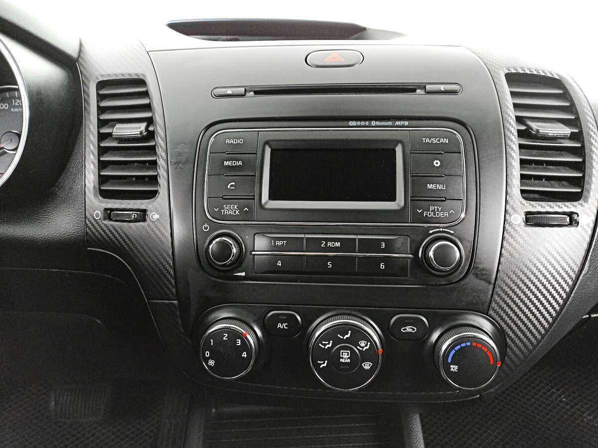 Kia Cerato 2014 года с пробегом. Фото: #12