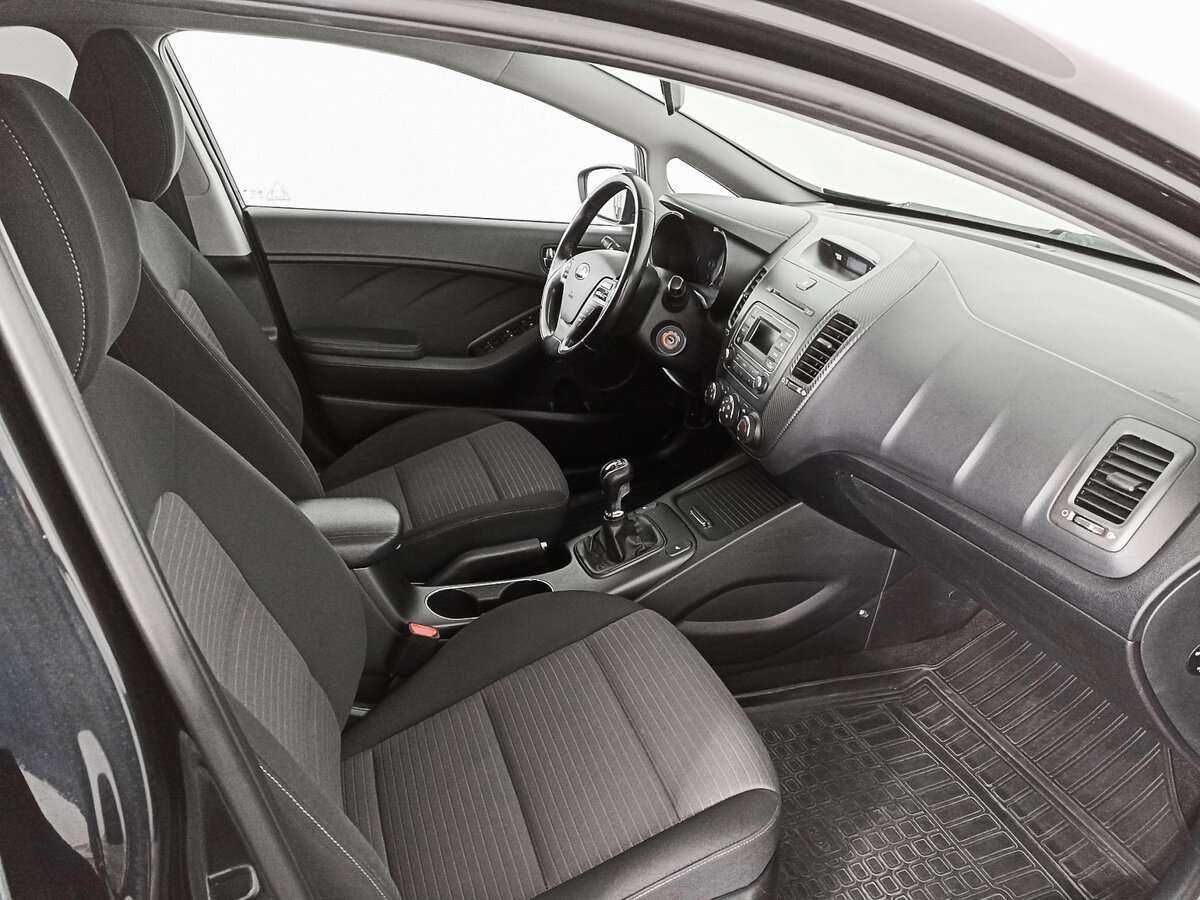 Kia Cerato 2013 года с пробегом. Фото: #8