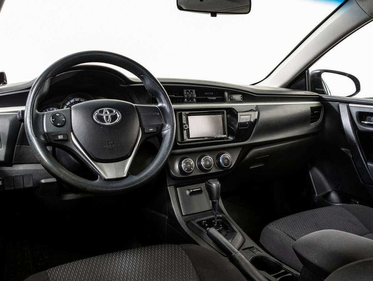 Toyota Corolla 2014 года с пробегом. Фото: #8