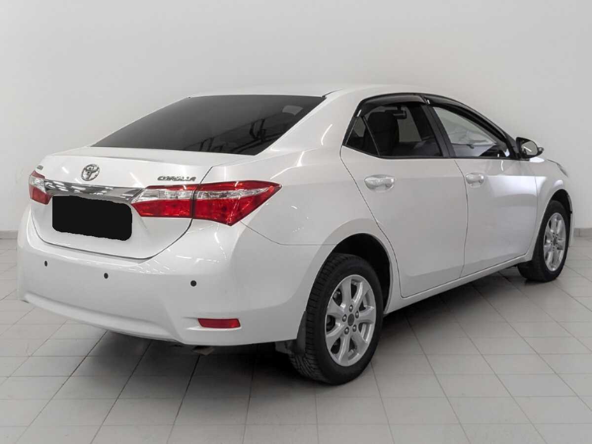 Toyota Corolla 2014 года с пробегом. Фото: #4