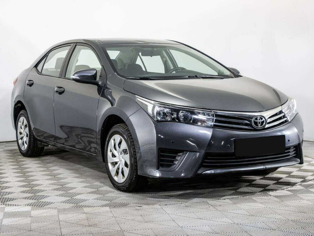 Toyota Corolla 2014 года с пробегом. Фото: #2