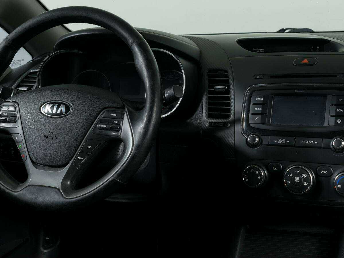 Kia Cerato 2014 года с пробегом. Фото: #10