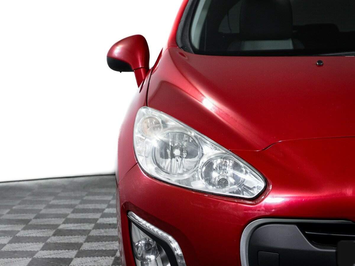 Peugeot 308 2012 года с пробегом. Фото: #16