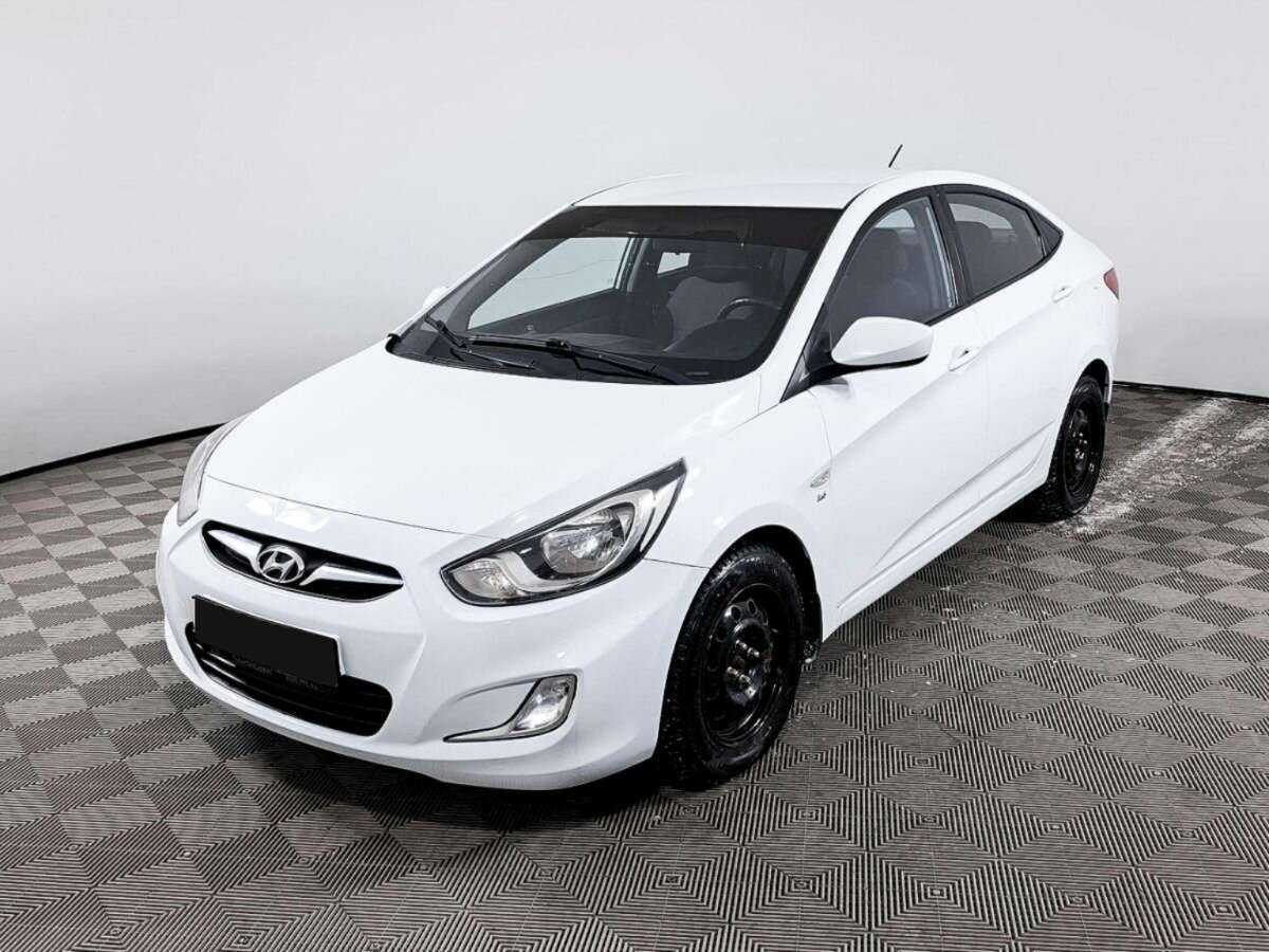 Hyundai Solaris 2013 года с пробегом. Посмотреть фото