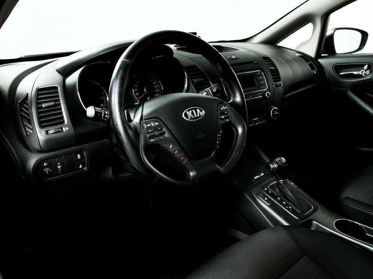 Kia Cerato 2014 года с пробегом. Фото: #12