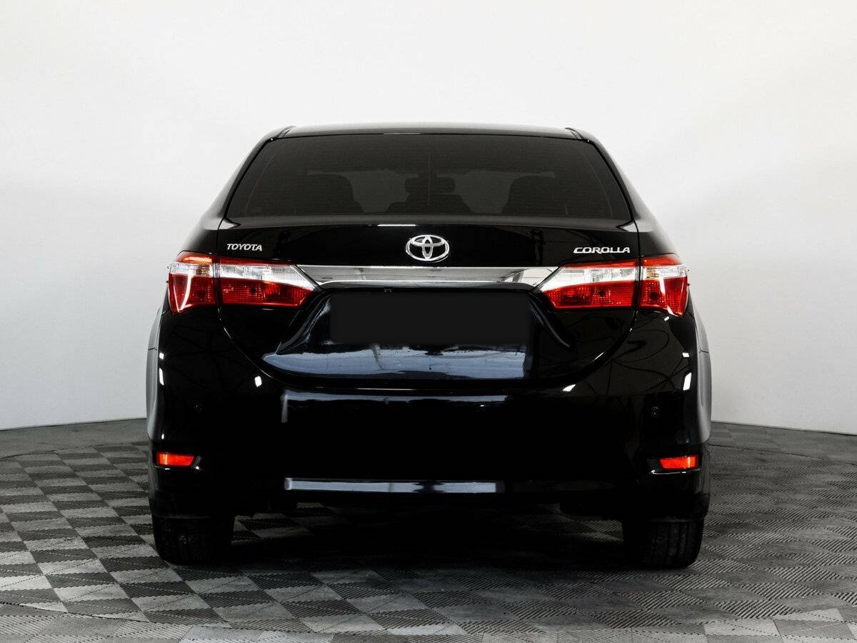 Toyota Corolla 2013 года с пробегом. Фото: #5