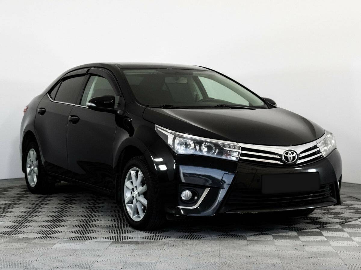 Toyota Corolla 2013 года с пробегом. Фото: #2