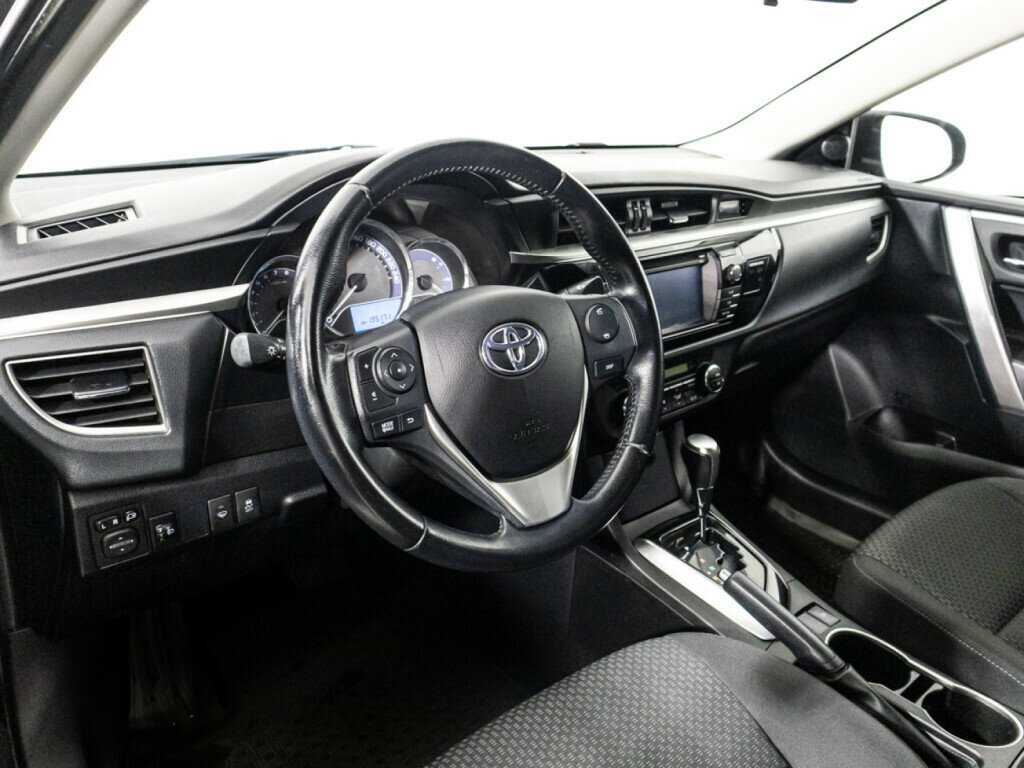 Toyota Corolla 2014 года с пробегом. Фото: #10