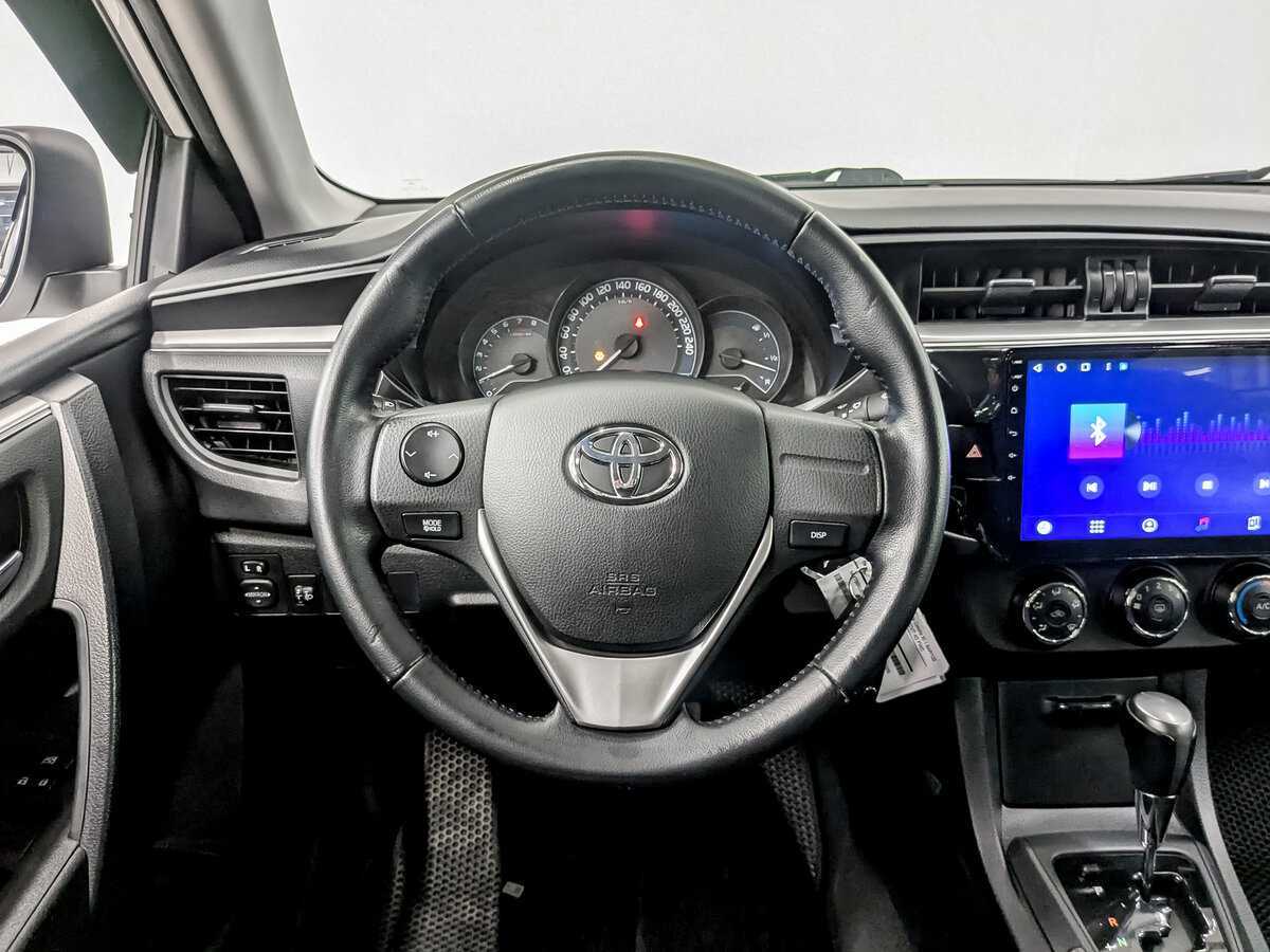 Toyota Corolla 2014 года с пробегом. Фото: #20