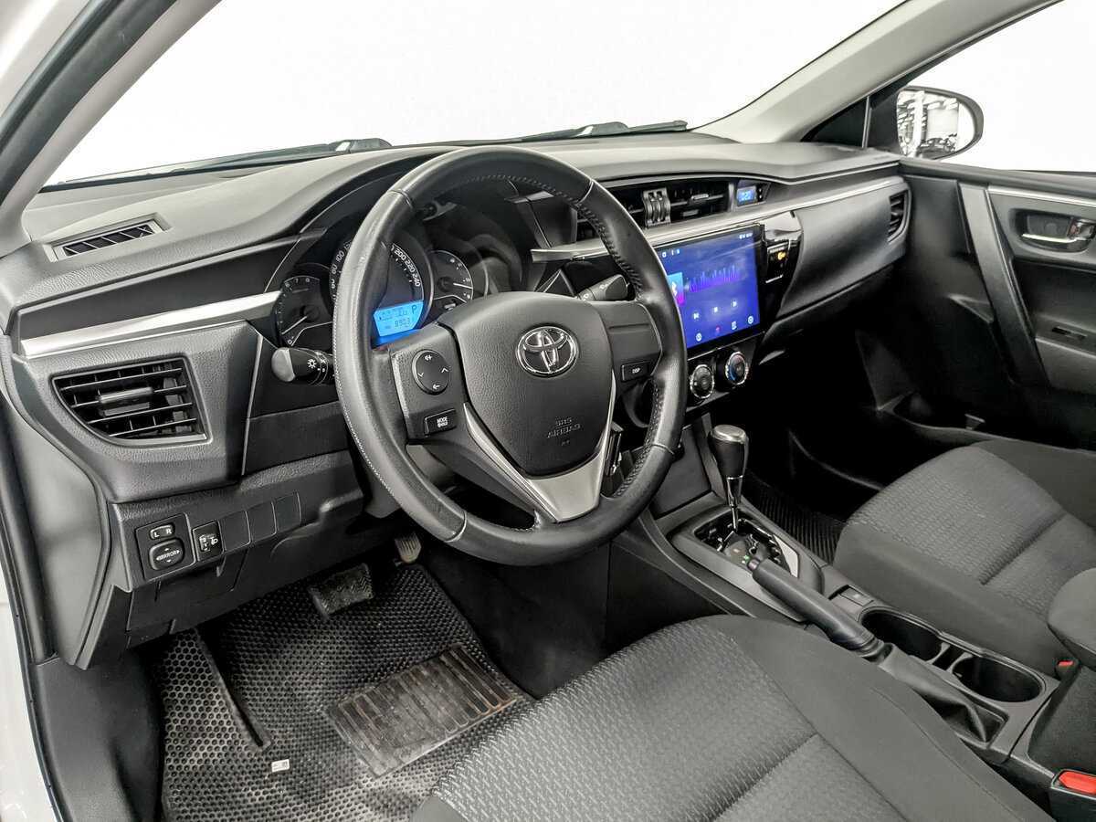 Toyota Corolla 2014 года с пробегом. Фото: #15