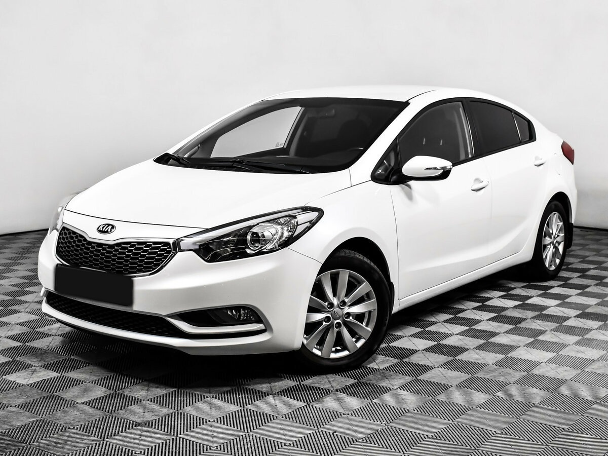Kia Cerato 2013 года с пробегом. Посмотреть фото