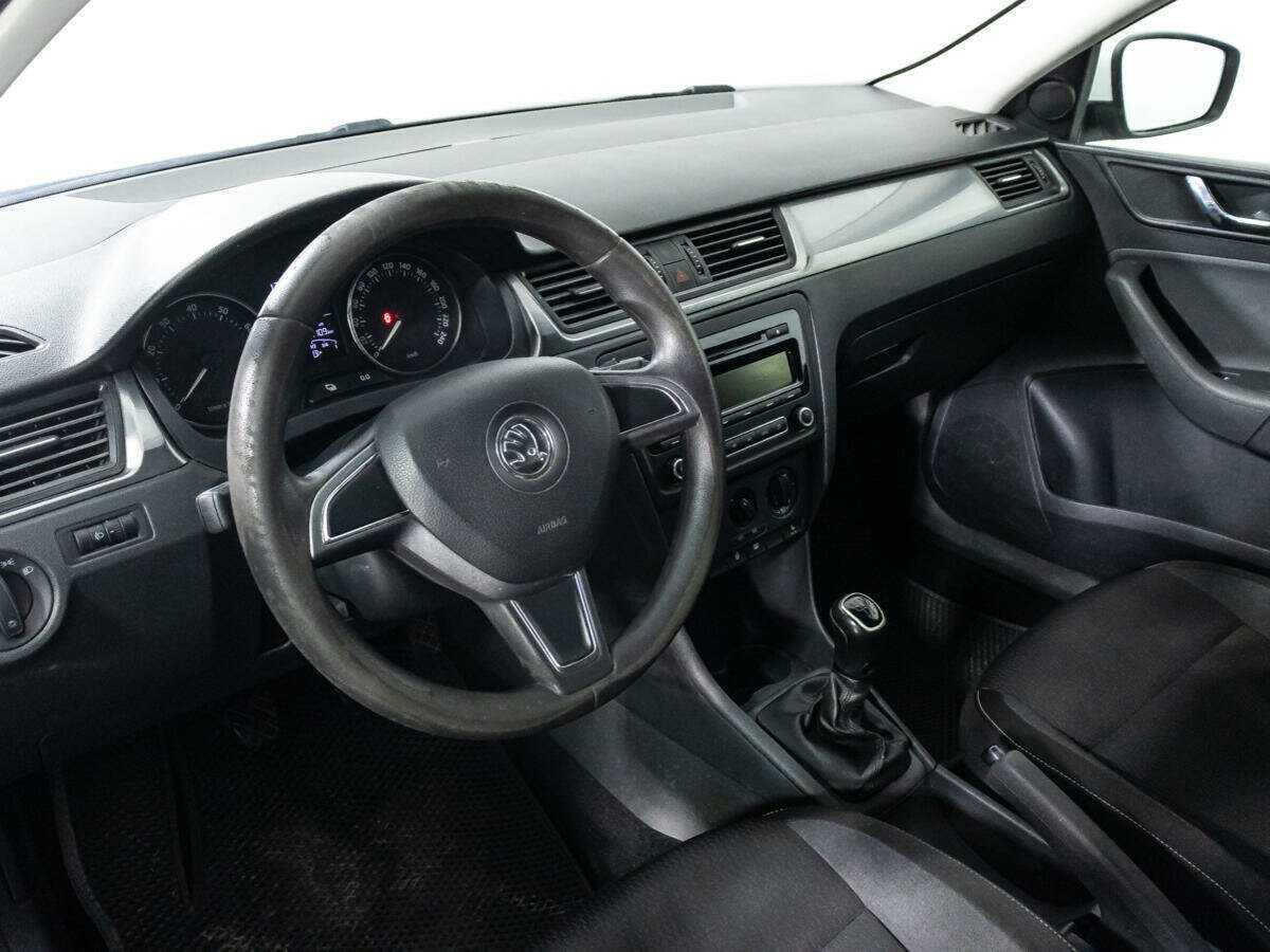 Skoda Rapid 2014 года с пробегом. Фото: #10