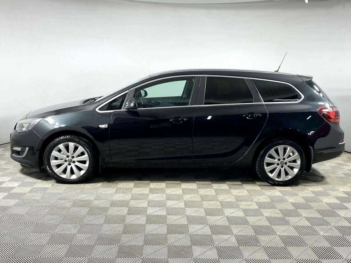 Б/У Опель Астра 2013 года. Фото: #7