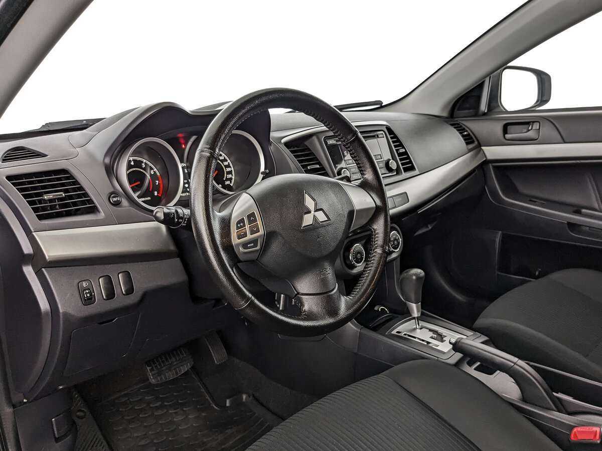 Б/У Митсубиши Лансер 2015 года. Фото: #9