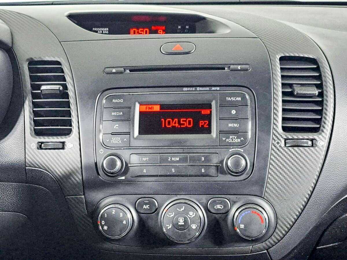 Kia Cerato 2014 года с пробегом. Фото: #12