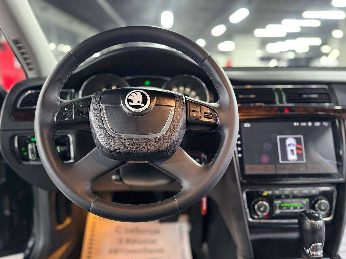 Skoda Superb 2013 года с пробегом. Фото: #7