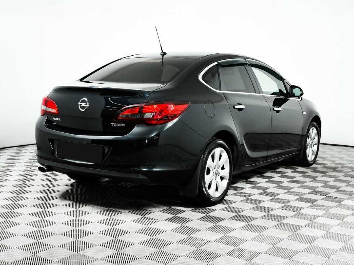 Б/У Опель Астра 2013 года. Фото: #4